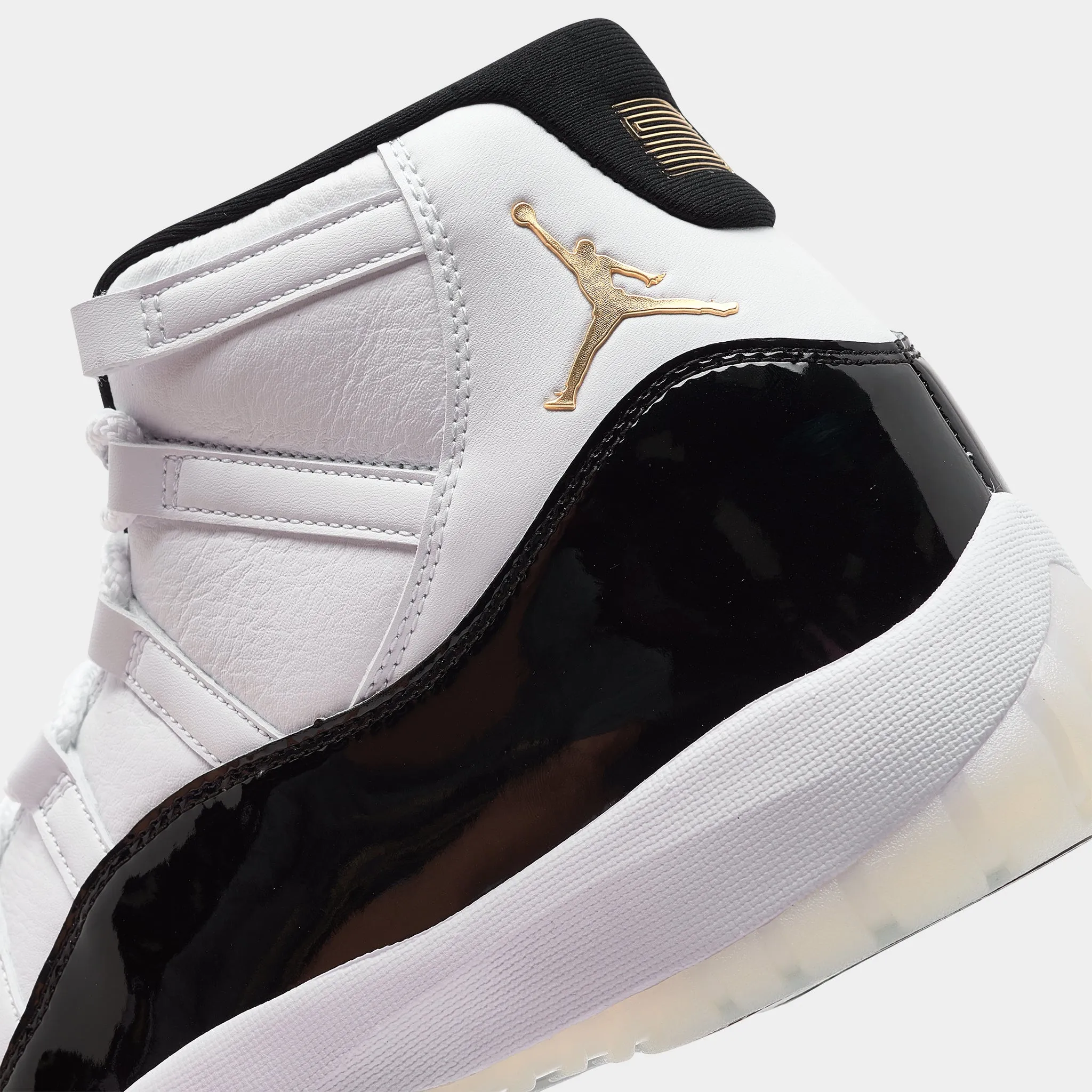 Jordan 11 Retro White / Metallic Gold - Black